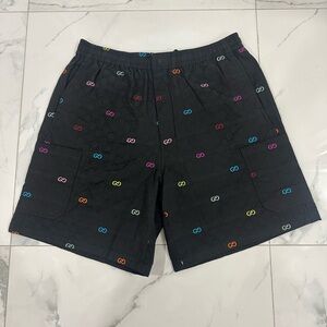 Gucci Black Shorts with Multicolor Logo Pattern